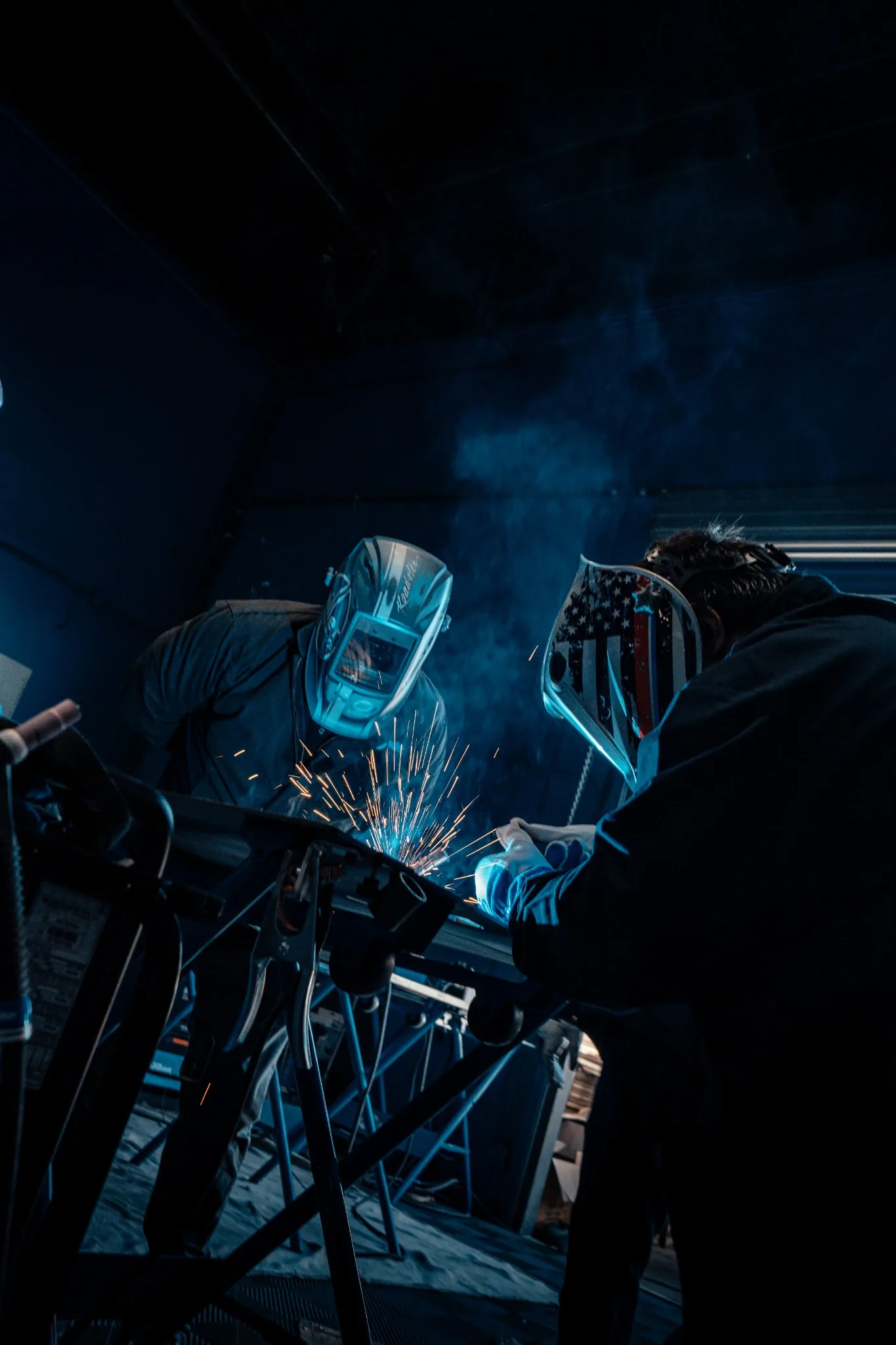West Coast Customs fabricators welding a custom vehicle