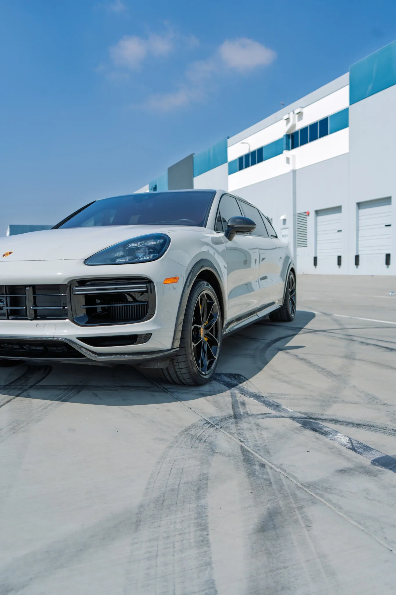 Front and side detail of the Chalk Porsche Cayenne Turbo GT Minivan